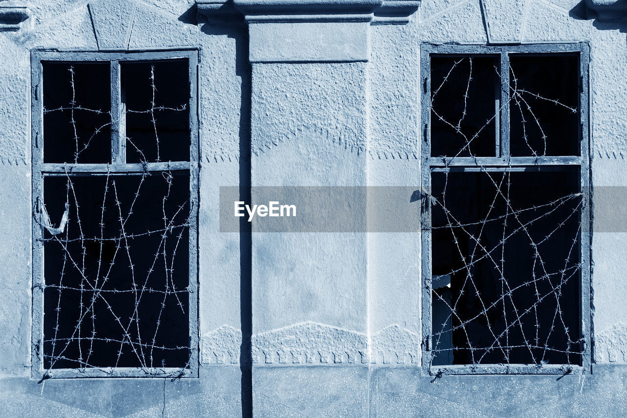 WINDOW OF ABANDONED HOUSE