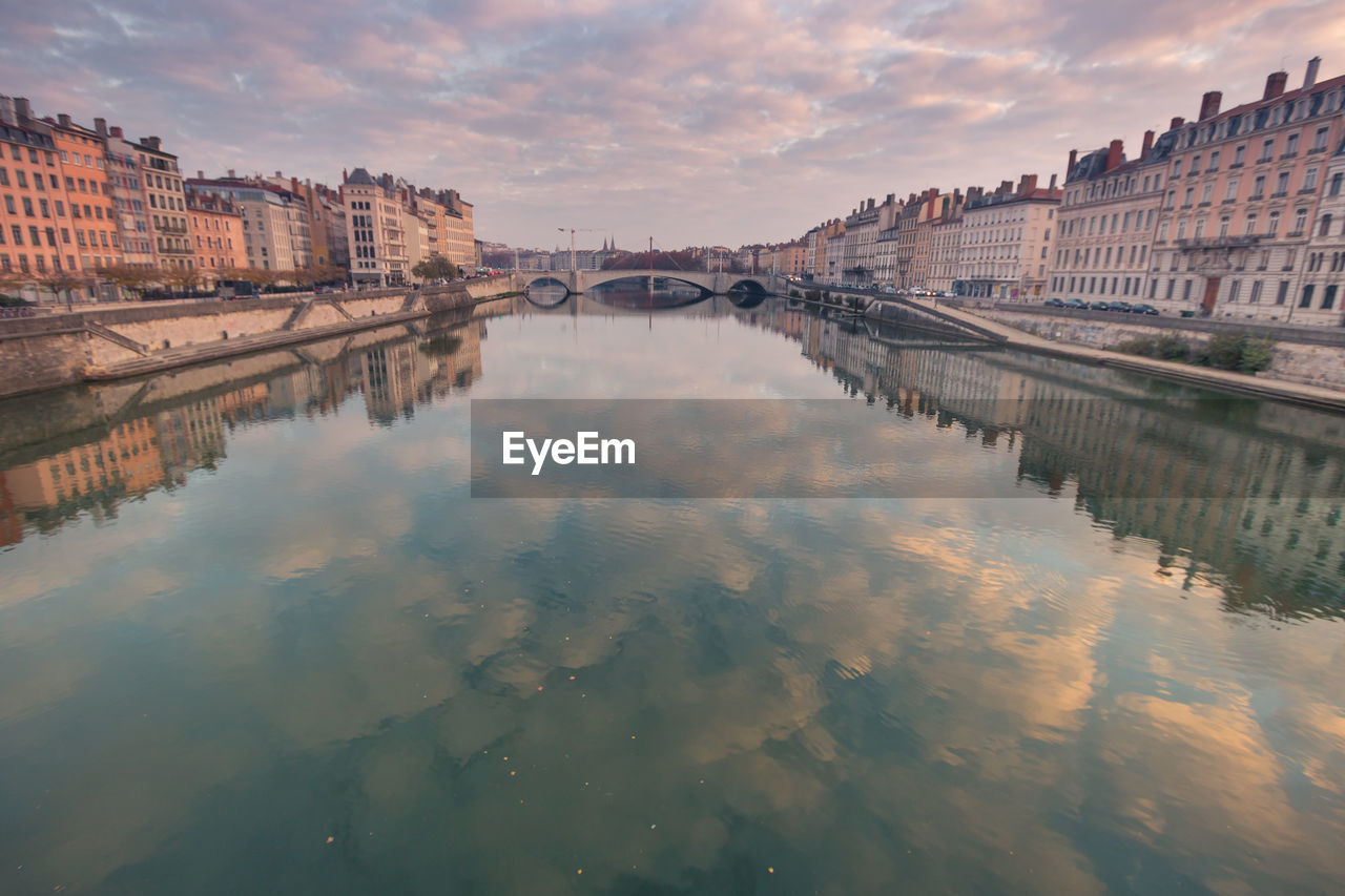 Reflection of buildings in water in lyon france