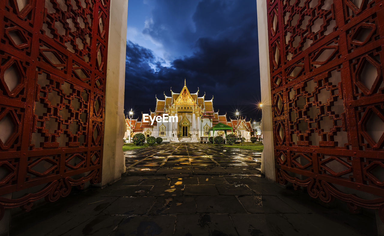 VIEW OF TEMPLE AGAINST BUILDINGS