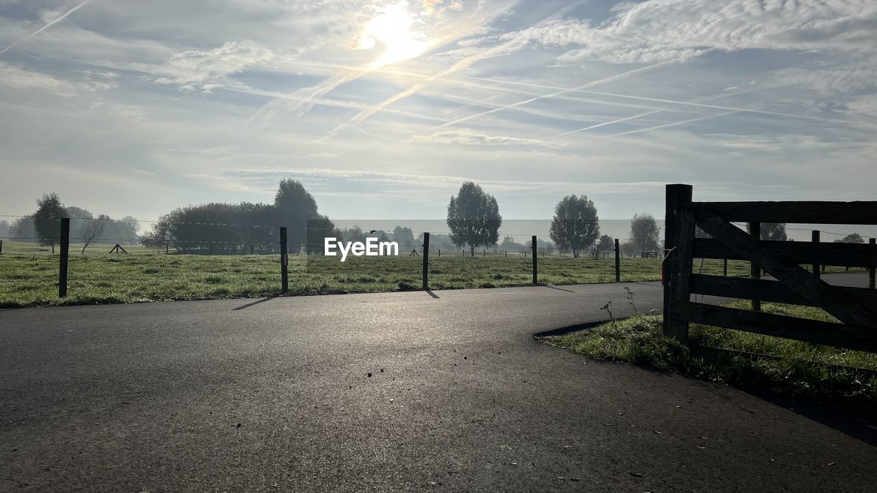 Empty road against sky