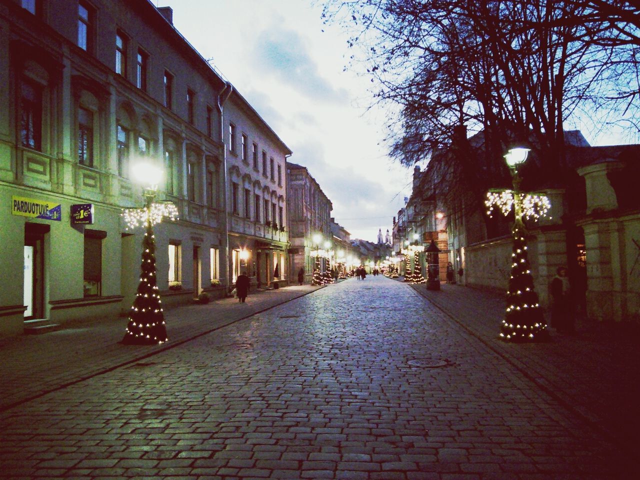 VIEW OF ILLUMINATED BUILDINGS IN CITY