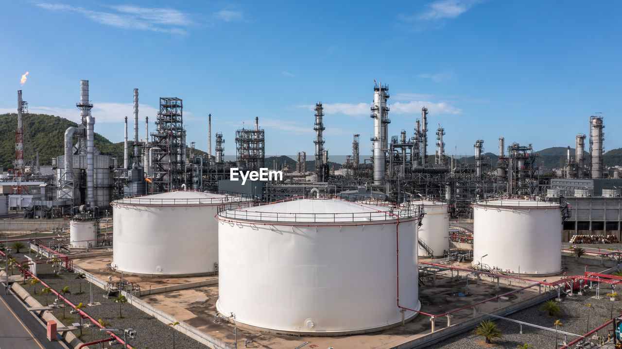 Oil and gas refinery petrochemical plant industrial with oil and gas storage tank, white oil and gas