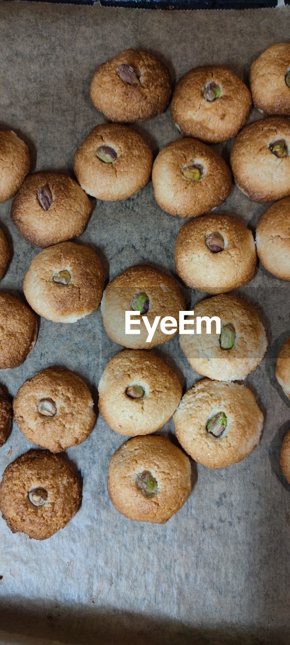 food, food and drink, freshness, cookies and crackers, baked, large group of objects, no people, dessert, abundance, indoors, still life, high angle view, snack, healthy eating, cookie, close-up, wellbeing, produce, brown, bread