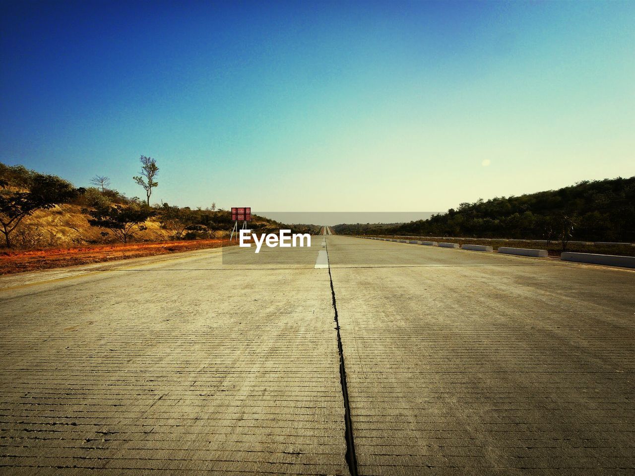 Surface level of country road along landscape