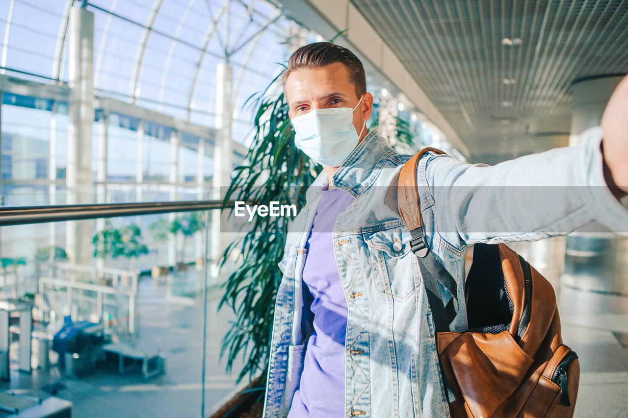 Man standing at airport