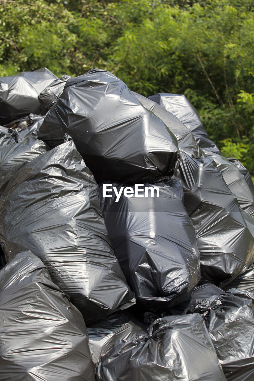 CLOSE-UP OF GARBAGE ON TREE