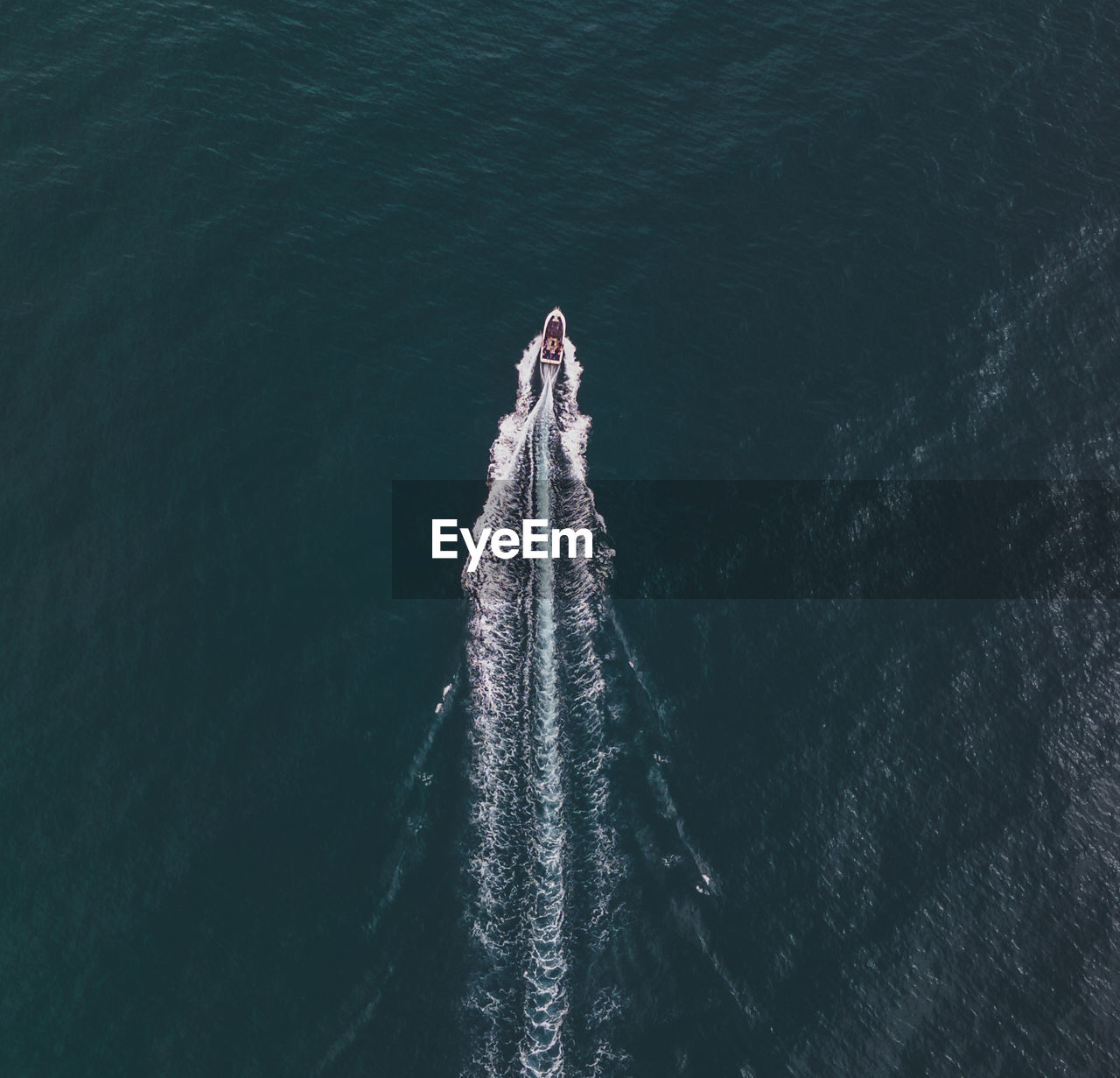 High angle view of ship sailing in sea