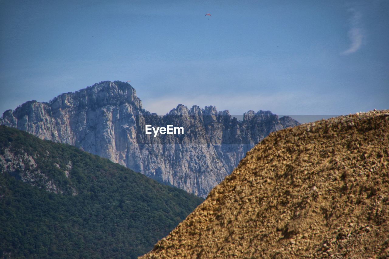 Scenic view of rocky mountains against sky