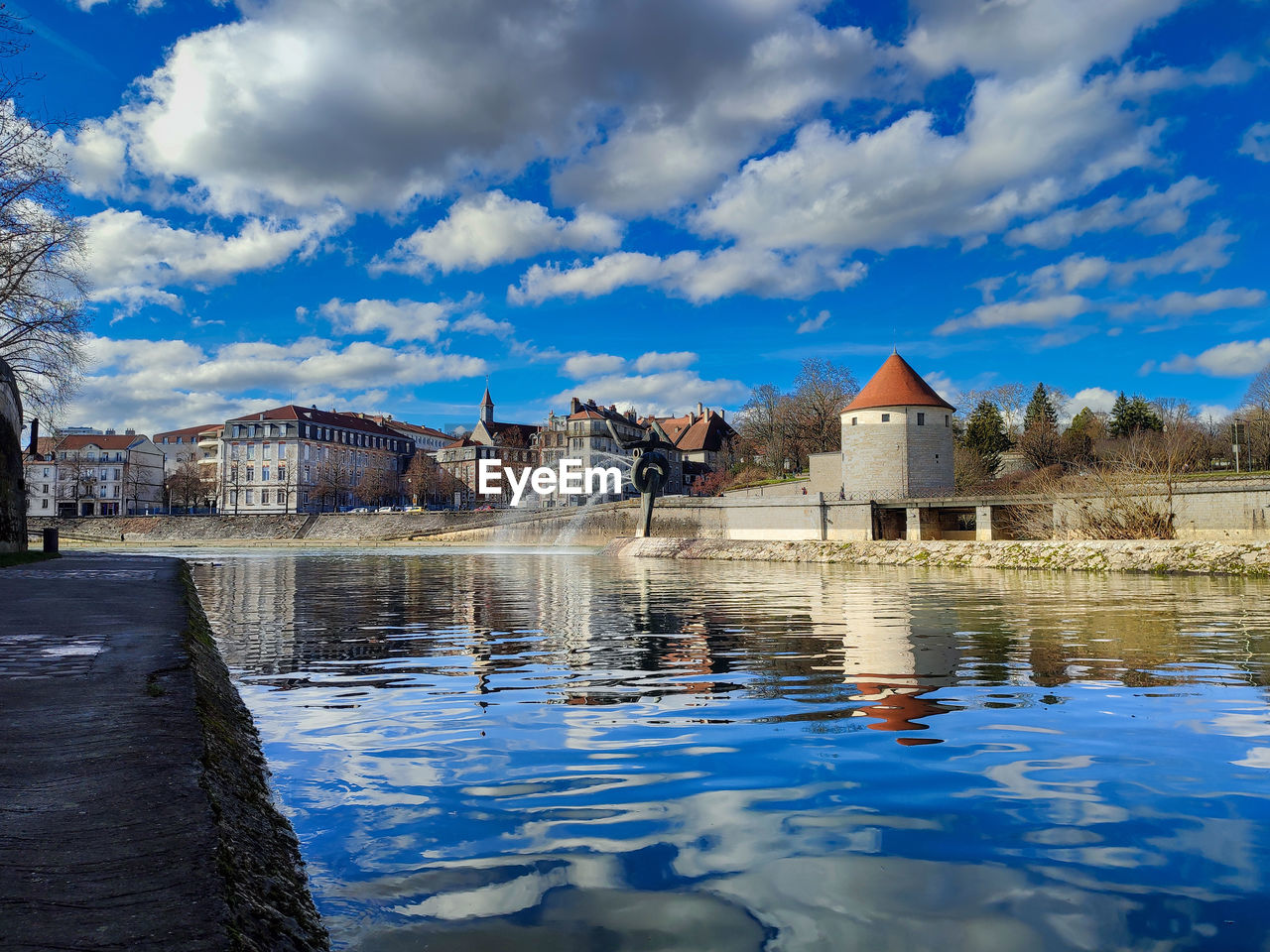 reflection, architecture, water, built structure, building exterior, sky, cloud, building, nature, river, travel destinations, house, blue, city, travel, no people, residential district, landscape, outdoors, tourism, evening, history, tree, bridge, environment, vacation, the past, day