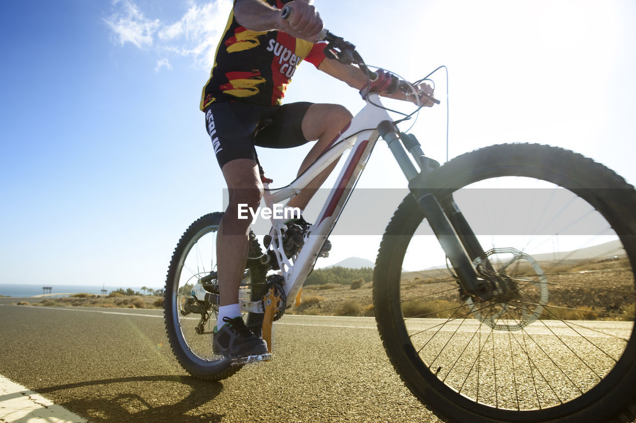 Spain, canary islands, fuerteventura, senior man on mountainbike