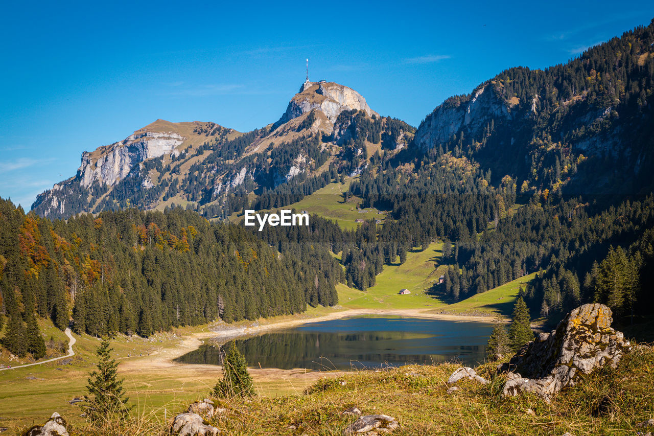 Lake saemtisersee with the hoher kaset mountain in the background