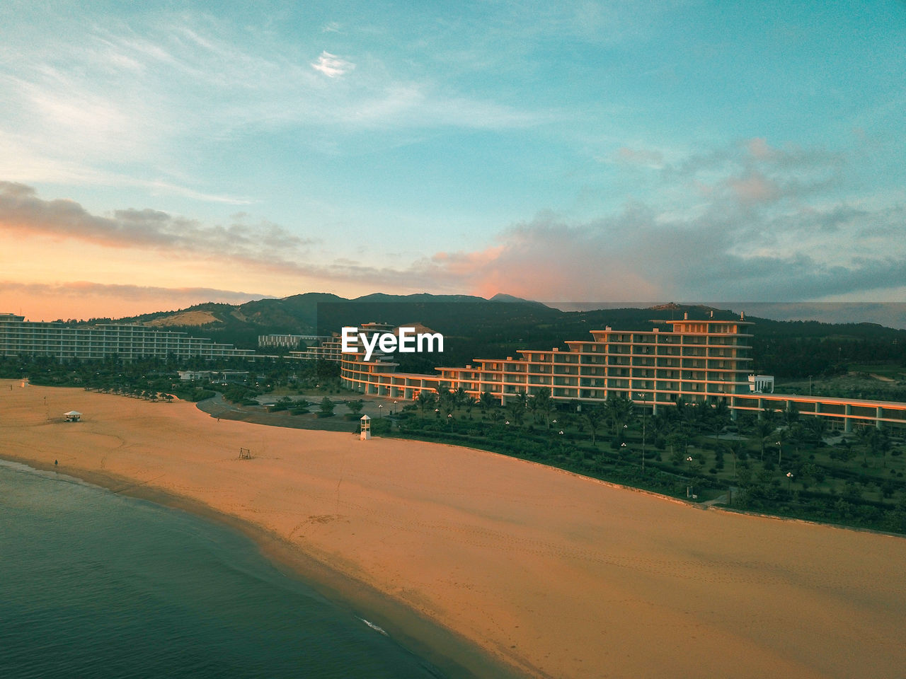 Scenic view of landscape against sky during sunset