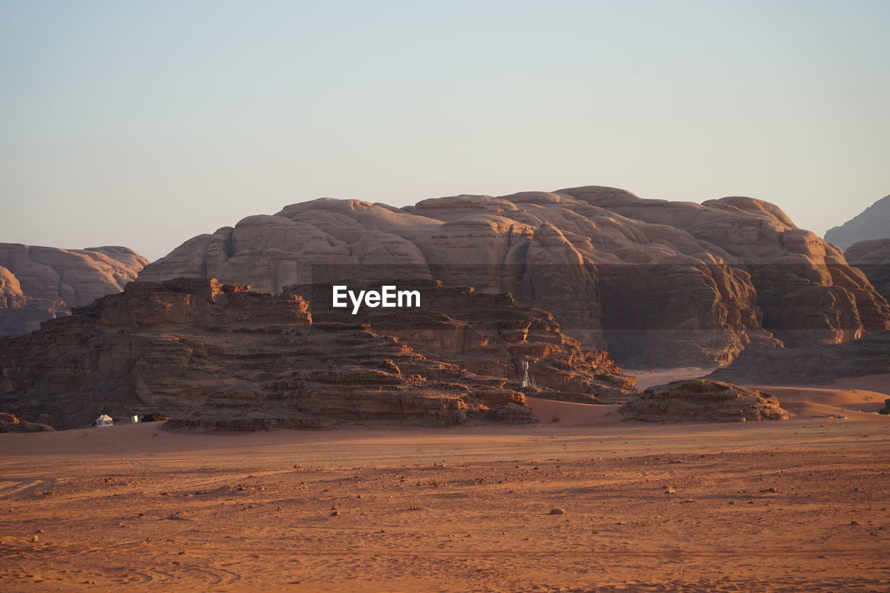 Scenic view of desert against clear sky