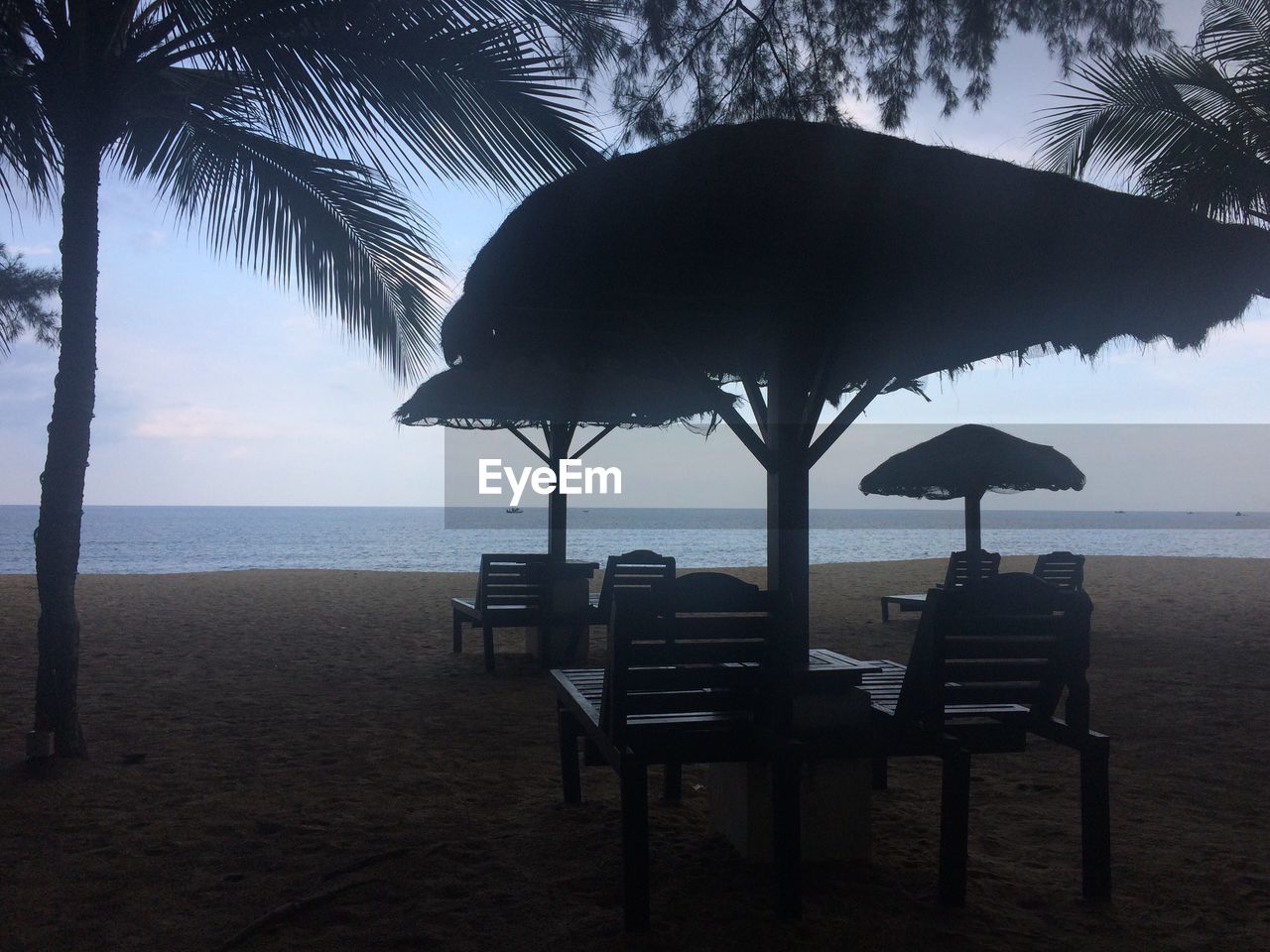 GAZEBO ON BEACH AGAINST SKY