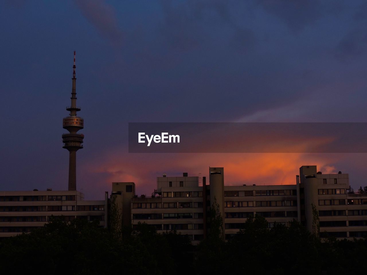 View of buildings against scenic sky