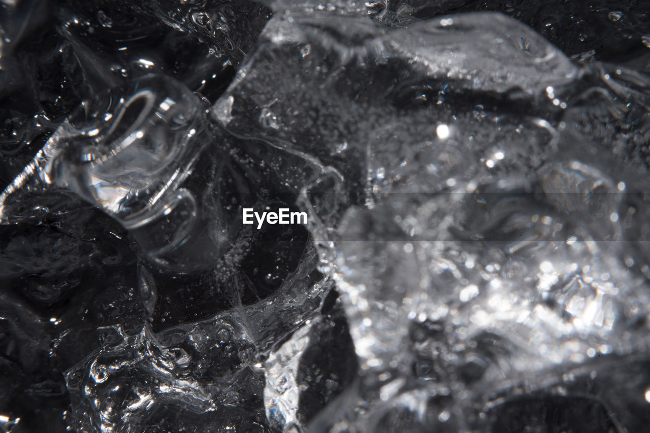CLOSE-UP OF ICE CUBES