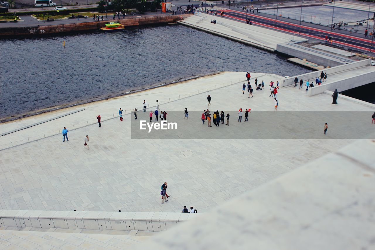 High angle view of people on road