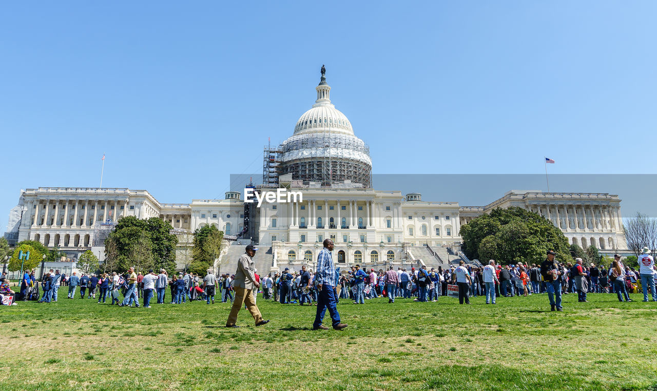 People at us state capitol building