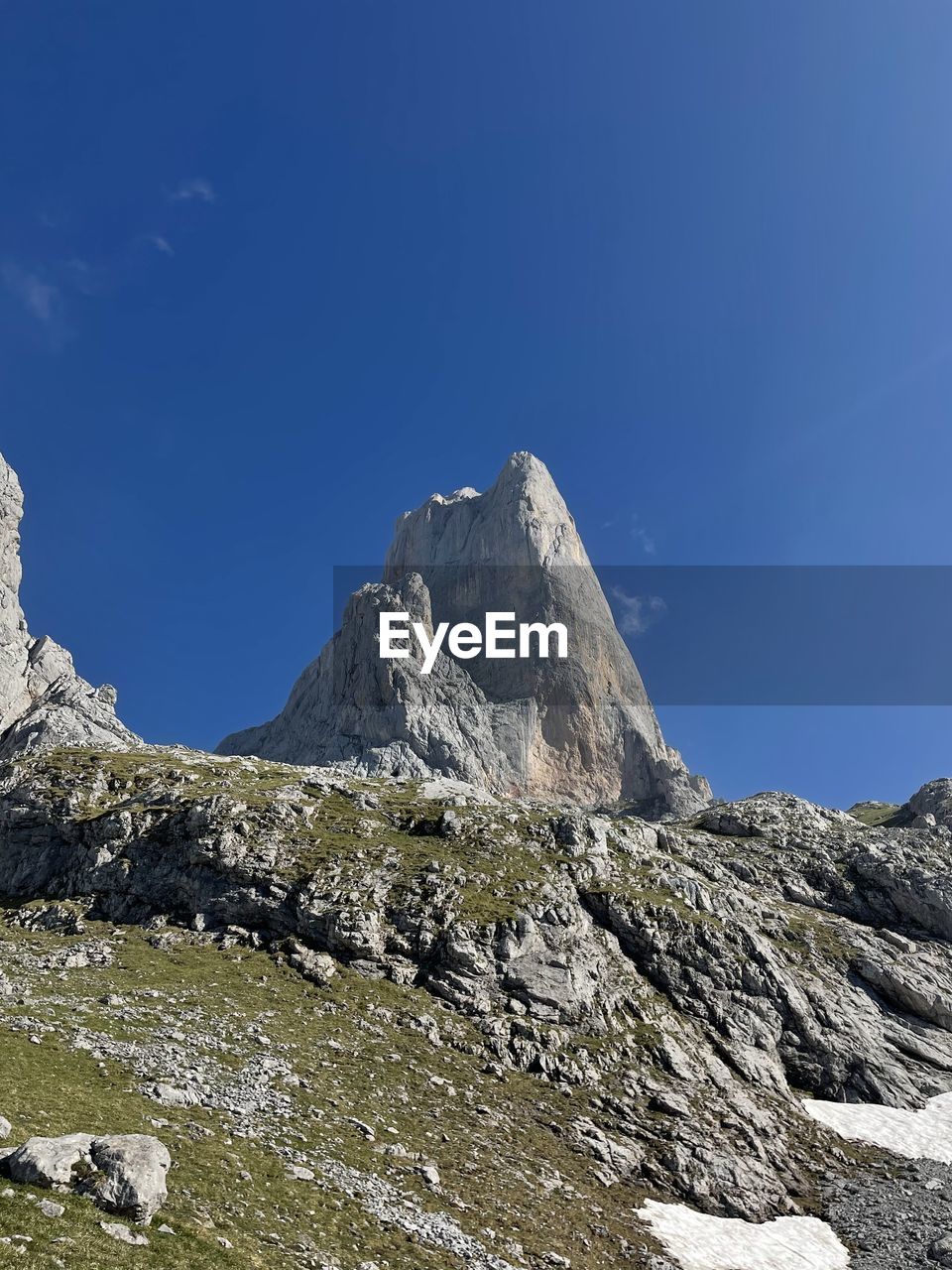Scenic view of mountain against blue sky. picos de europa