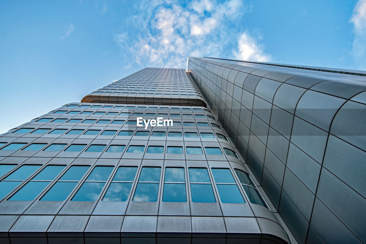 low angle view of modern buildings against sky