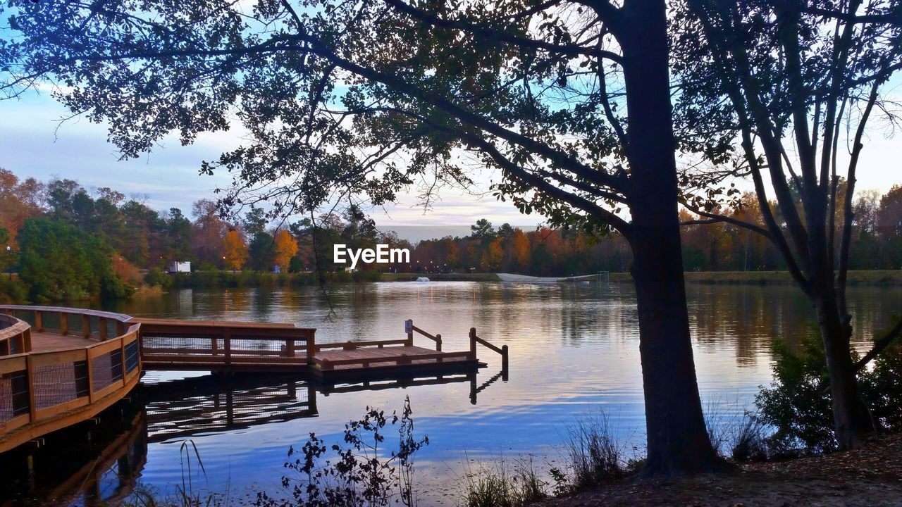 SCENIC VIEW OF LAKE AGAINST TREES