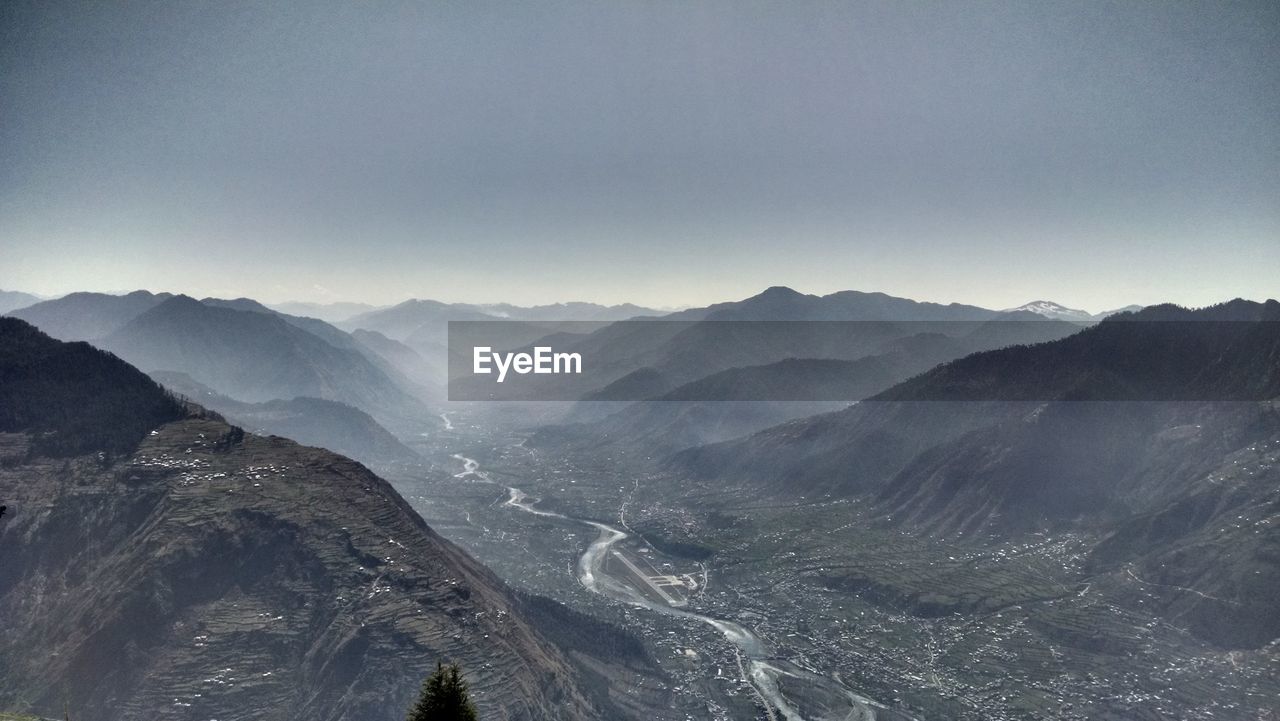 Scenic view of mountains against clear sky