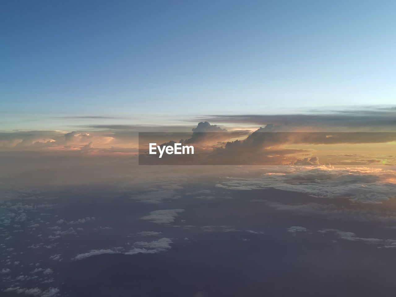 Aerial view of cloudscape against sky during sunset