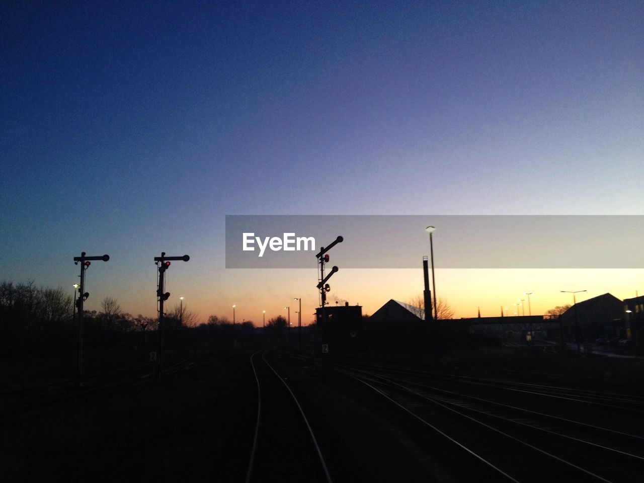Silhouette of railroad tracks