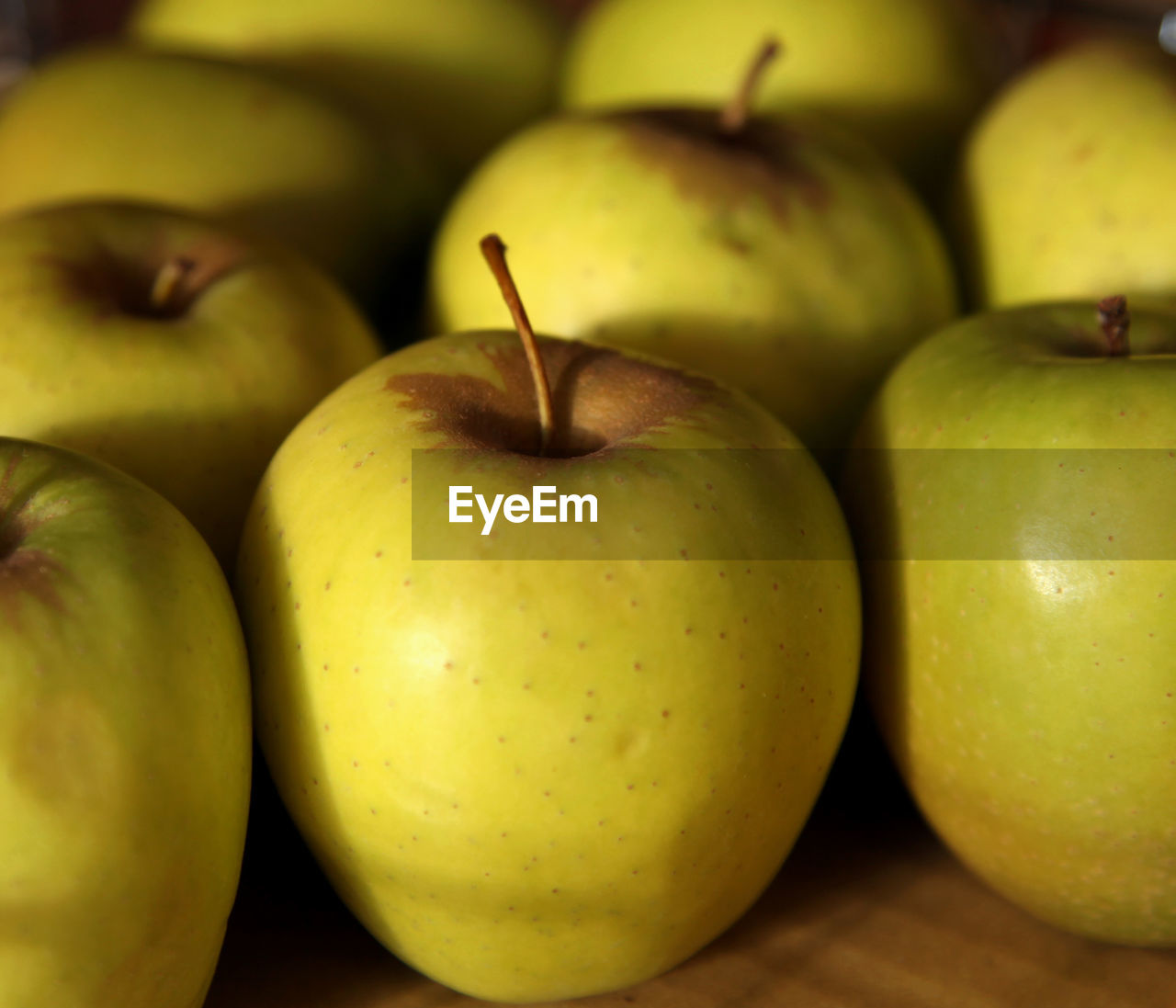 Close-up of granny smith apples for sale at market