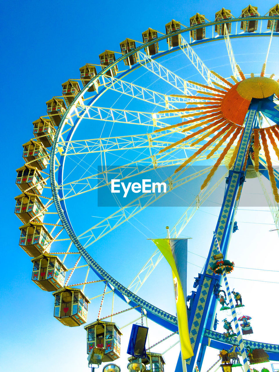 LOW ANGLE VIEW OF FERRIS WHEEL AGAINST SKY