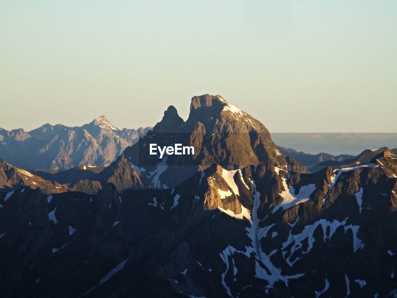 Scenic view of mountains against clear sky