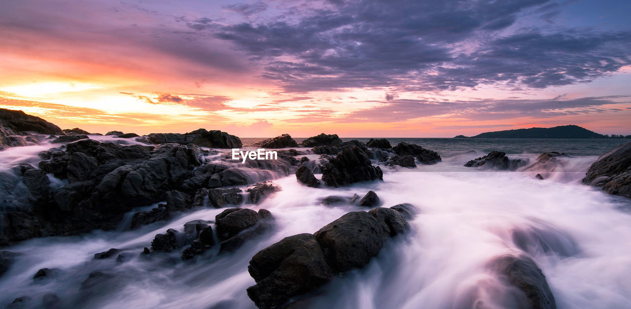 scenics - nature, environment, beauty in nature, sky, water, sunset, landscape, nature, cloud, land, long exposure, motion, sea, rock, wave, waterfall, coast, travel destinations, body of water, sun, travel, wind wave, outdoors, fog, no people, ocean, dramatic sky, shore, tourism, dawn, idyllic