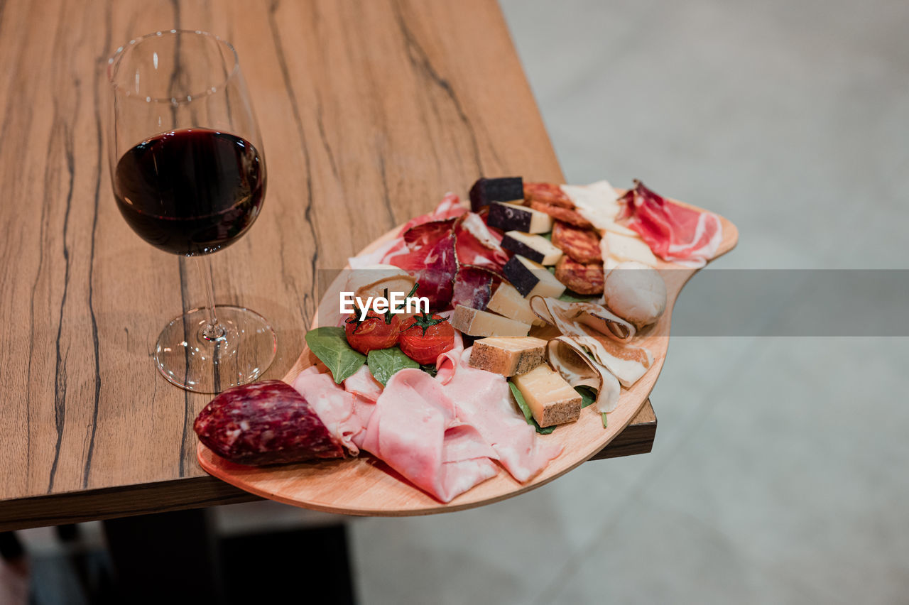 High angle view of drink in glass on table