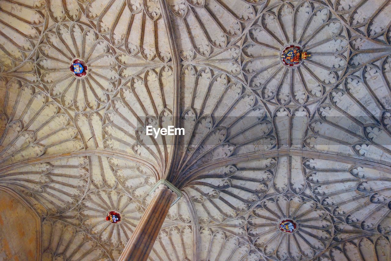 Low angle view of designed ceiling in building