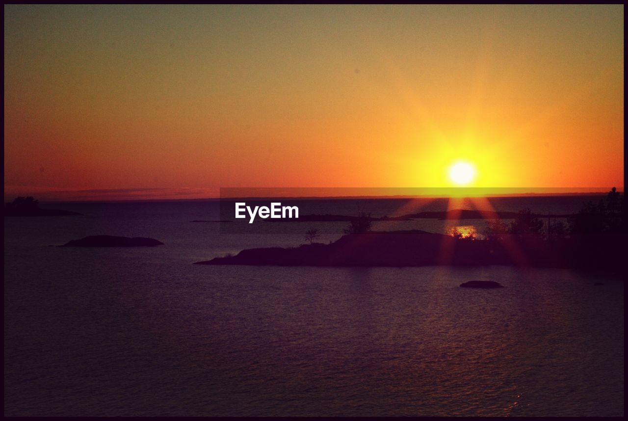 SUNSET OVER SEA