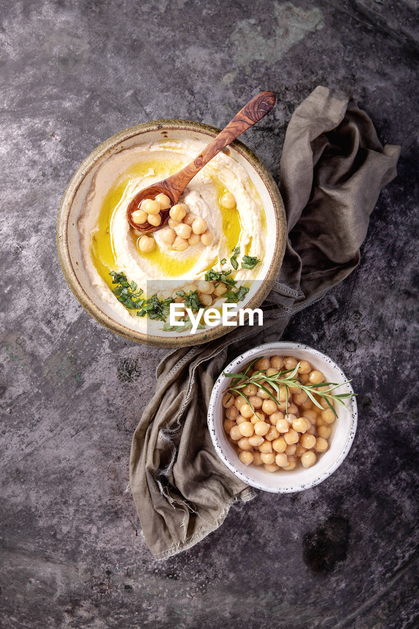 High angle view of hummus in bowl on table
