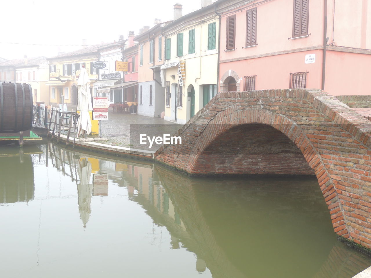 RIVER WITH BUILDINGS IN BACKGROUND