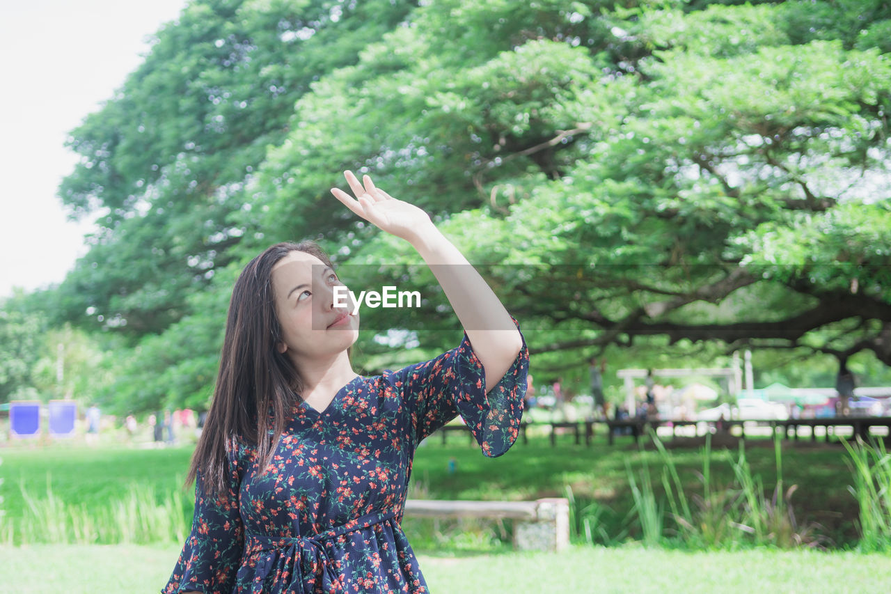 Beautiful woman standing in park