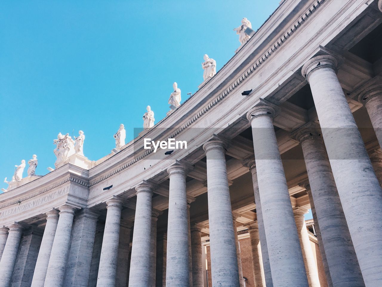 Low angle view of columns at church against clear sky