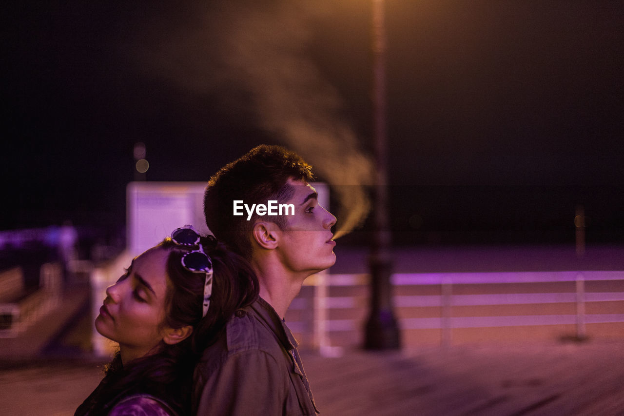 Young couple smoking