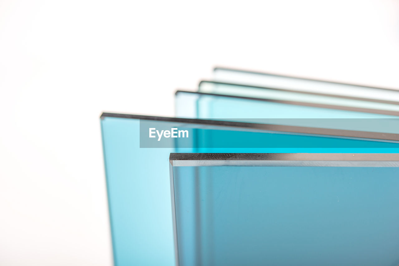 CLOSE-UP OF BLUE CONTAINER