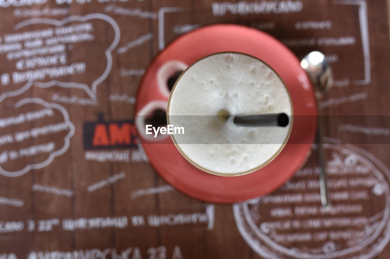 DIRECTLY ABOVE SHOT OF COFFEE ON TABLE