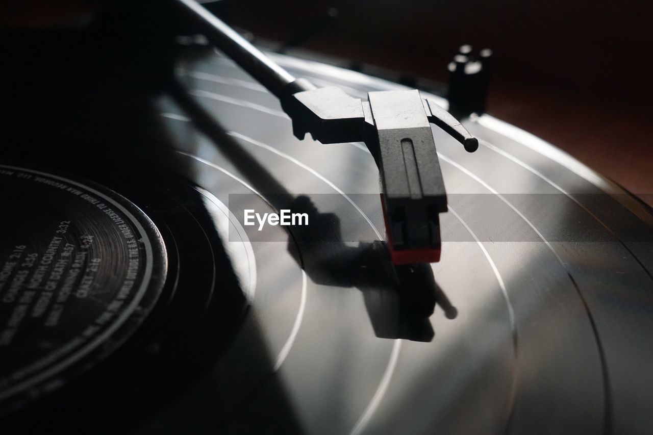 Close-up of turntable and record player needle