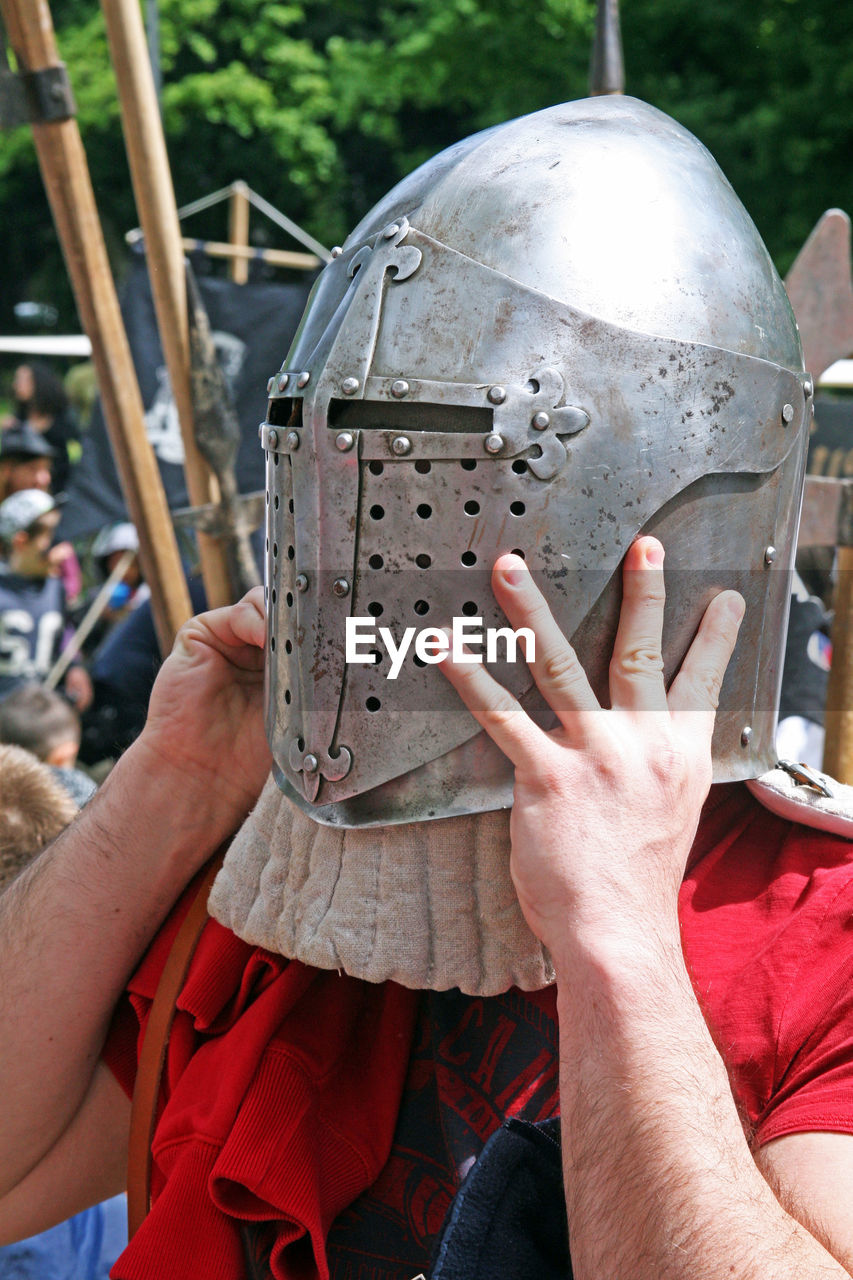 Man wearing knight helmet