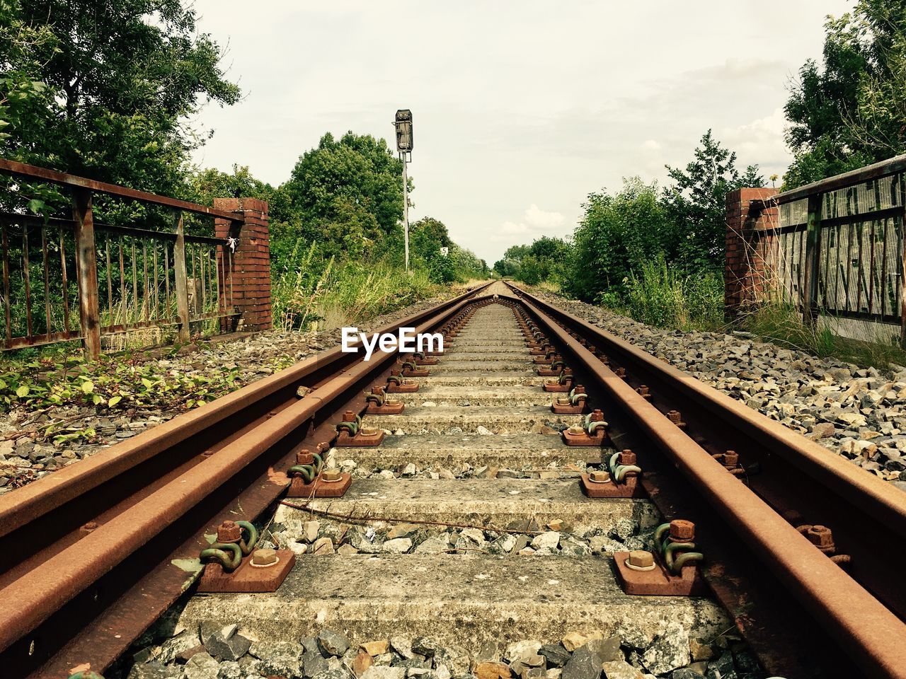 RAILROAD TRACKS AGAINST SKY