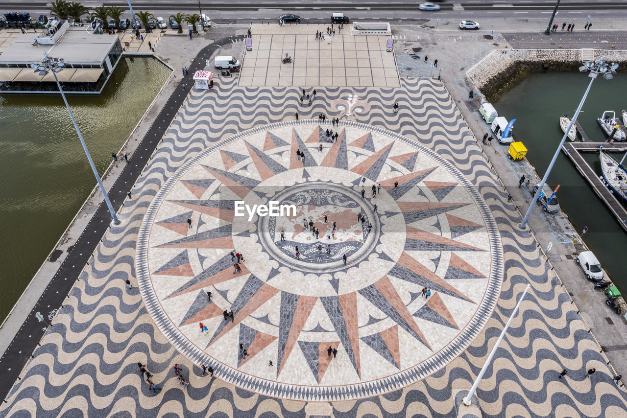 High angle view of people on patterned floor
