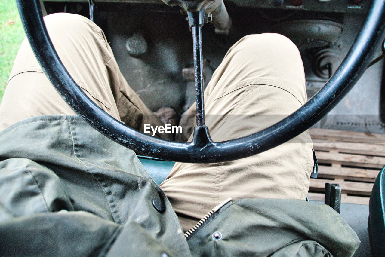 Close-up of man driving car