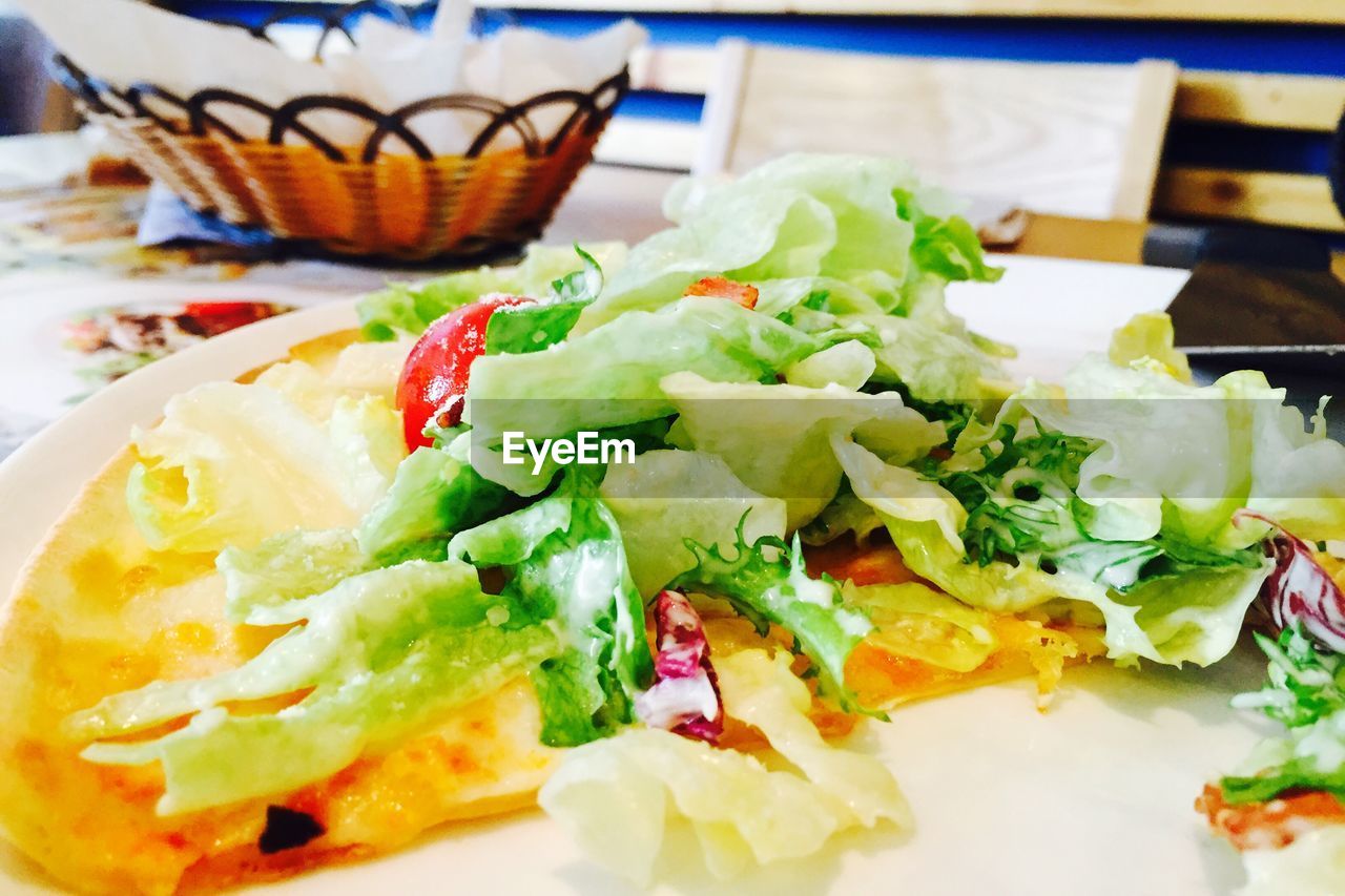 CLOSE-UP OF SERVED FOOD IN PLATE