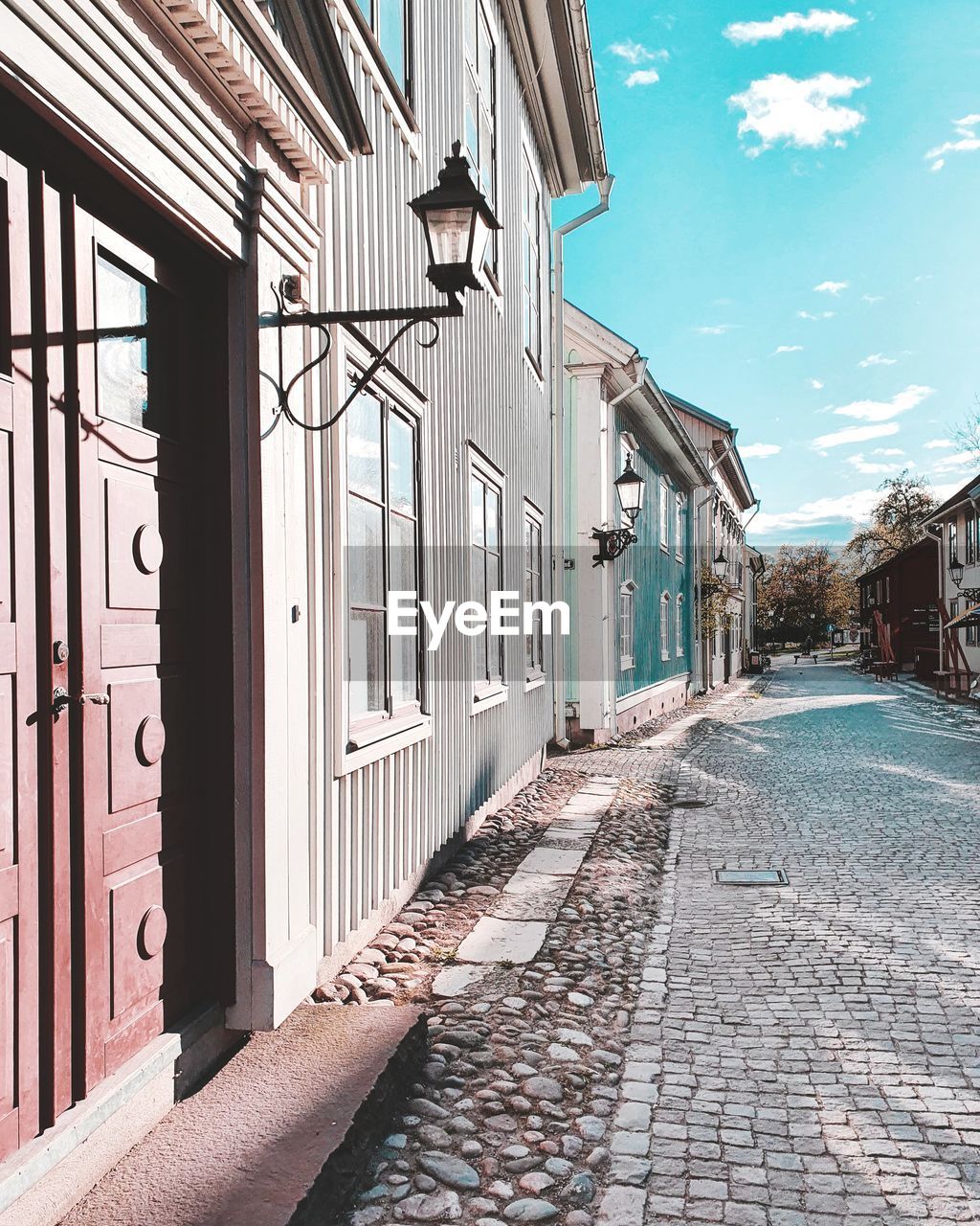 Alley amidst buildings in city