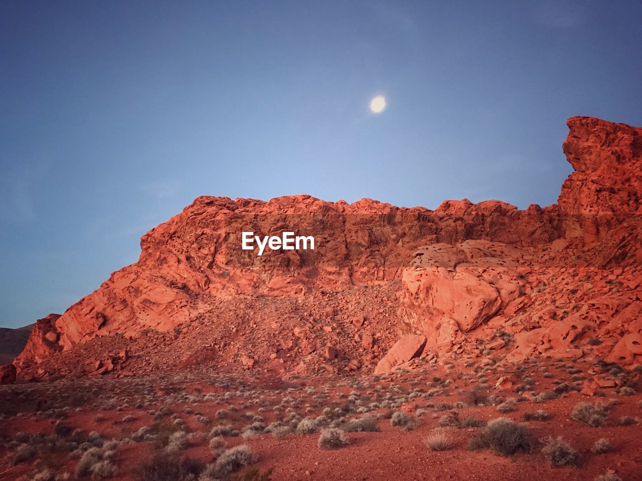 Low angle view of rock formation against sky